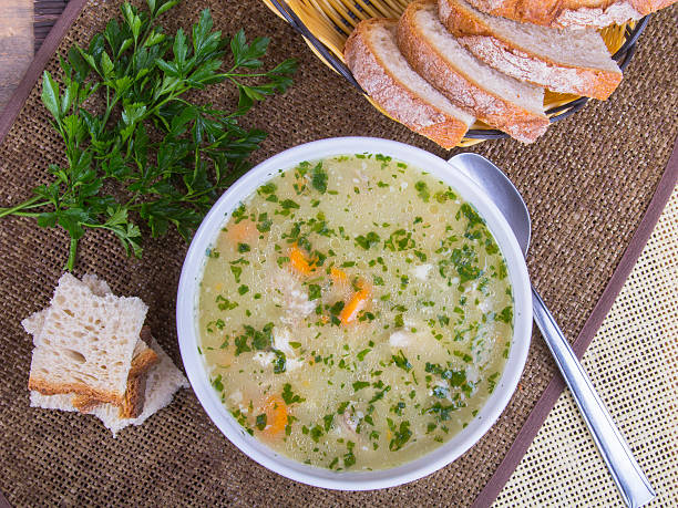 sopa de cebada tradicional en un tazón con pan blanco - cooking domestic kitchen vegetable soup fotografías e imágenes de stock