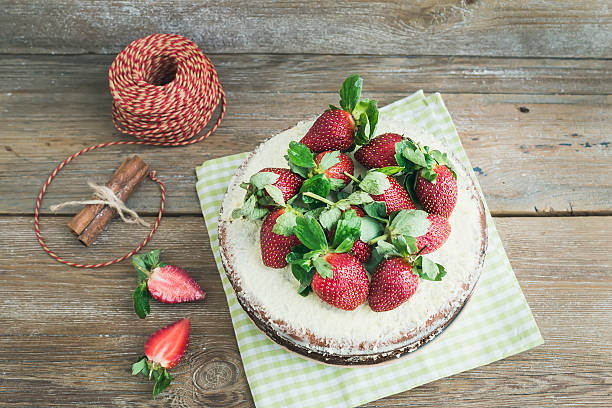istock Rustic spicy ginger cake with cream-cheese filling and fresh str 531088309