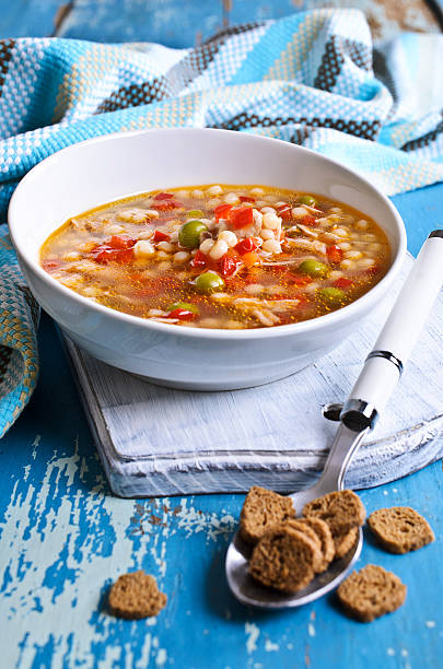 istock Soup with small pasta, vegetables and pieces of meat 531090787