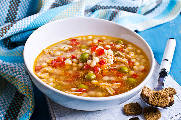 istock Soup with small pasta, vegetables and pieces of meat 531090895