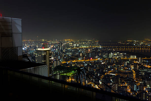 Osaka, Japan -  June 17, 2010 : Skyline of central Osaka and Yodo River with numerous bridges seen from Umeda Sky Building. Osaka is Japan's third largest city and an important economic center.
