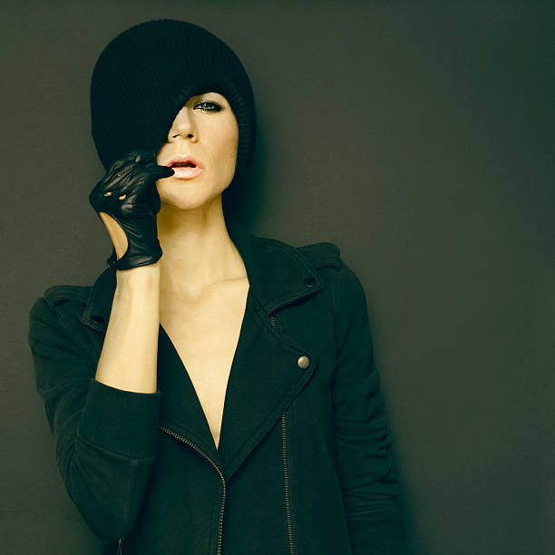 istock glamorous lady on black background in trendy gloves 531101519