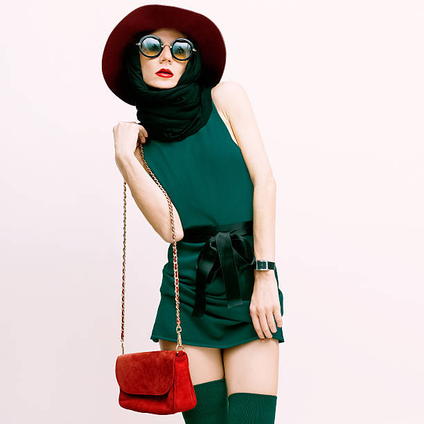 istock Glamorous lady in vintage trend accessories. Green and red combi 531106475