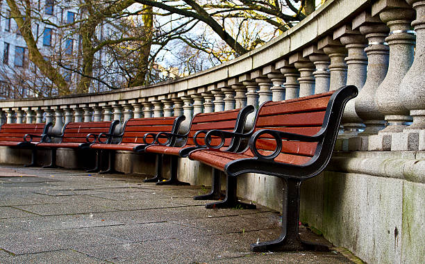 Row of empty Wooden Benches stock photo