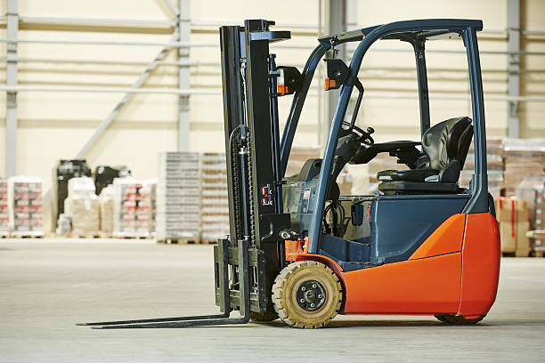 forklift loader stacker truck at warehouse forklift loader pallet stacker truck equipment at warehouse forklift photos stock pictures, royalty-free photos & images