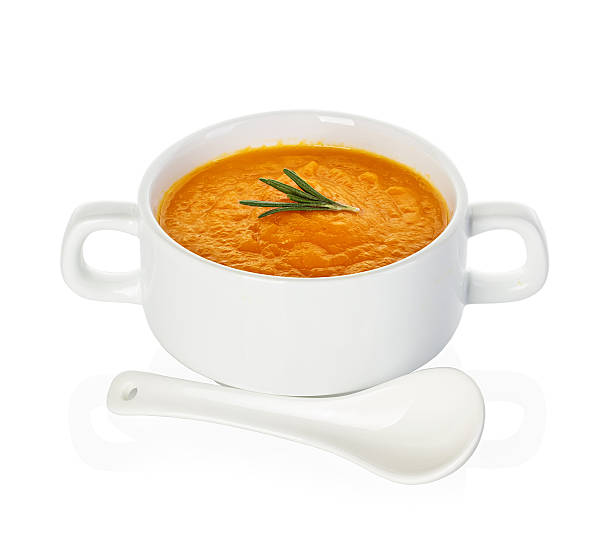 istock Pumpkin soup isolated on white background 531110629
