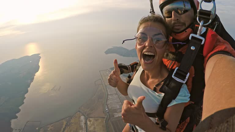 POV Woman excited in her first skydive in a tandem