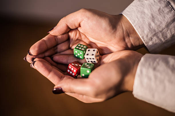 dices - dice rolling throwing businessman stock-fotos und bilder