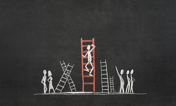 istock Stick Figure Climbing Ladder Of Success 531114183