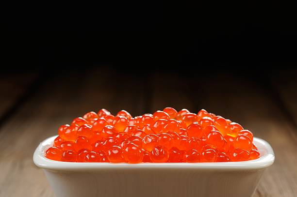 istock Red caviar in white bowl closep 531117369