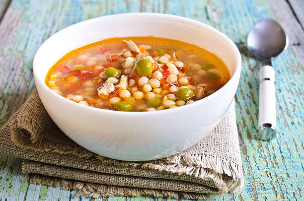 istock Soup with small pasta, vegetables and pieces of meat 531117759