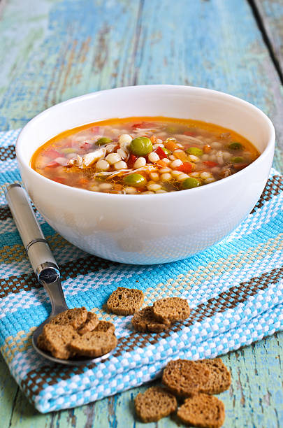 istock Soup with small pasta, vegetables and pieces of meat 531117767