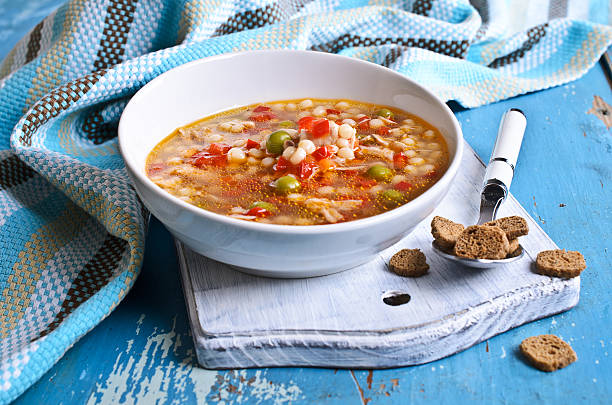 istock Soup with small pasta, vegetables and pieces of meat 531117769