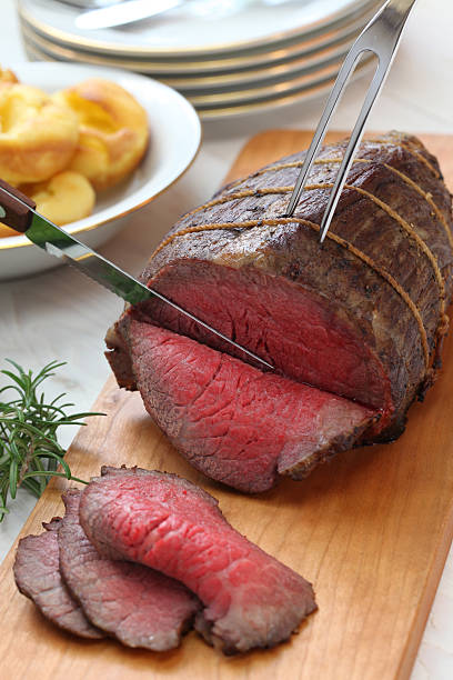 roast beef carving roast beef carving, sunday dinner carving set stock pictures, royalty-free photos & images