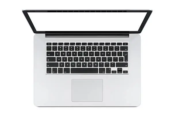 Photo of Top view of modern laptop with English keyboard