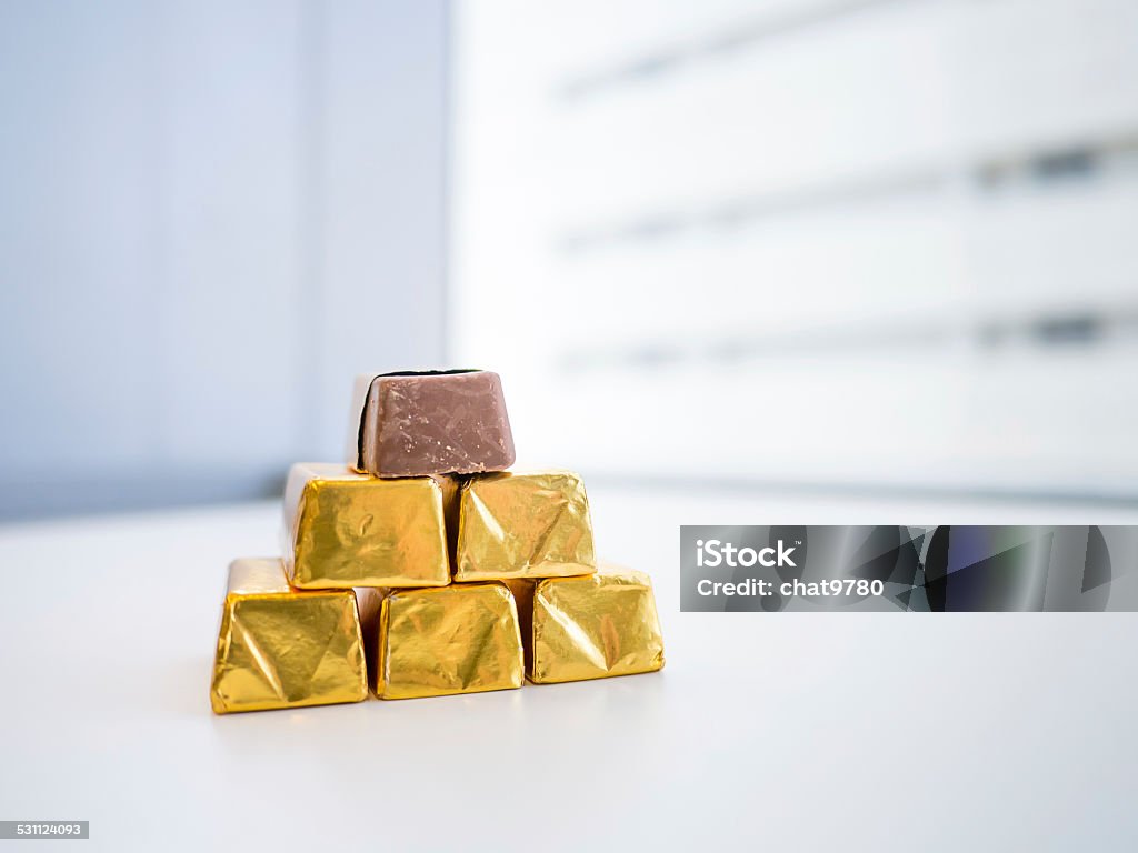 Chocolate Candy In Golden Wrap Stock Photo - Download Image Now