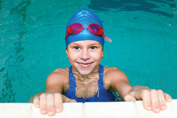 istock girl start to swimming pool 531129375