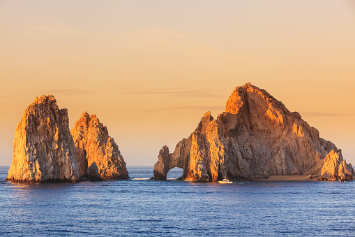 The arch of Cabo San Lucas at sunrise. Mexico