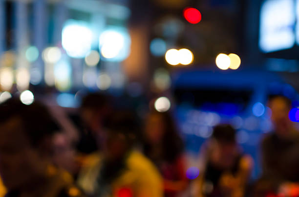 istock people walk on road ,Bokeh of Evening traffic jam 531130839