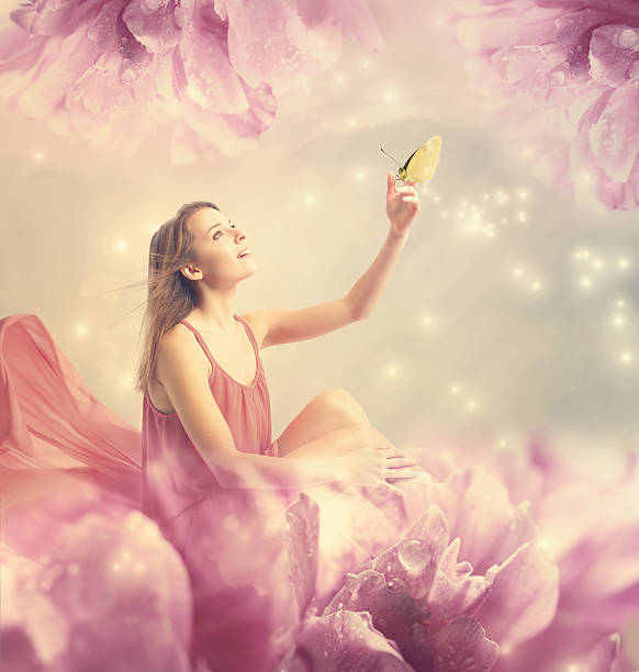 istock Beautiful young woman with small butterfly 531134433