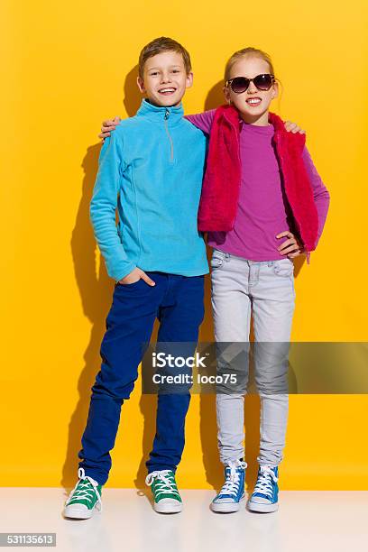 Little Friends Stock Photo - Download Image Now - Colored Background, Sports Shoe, Boys
