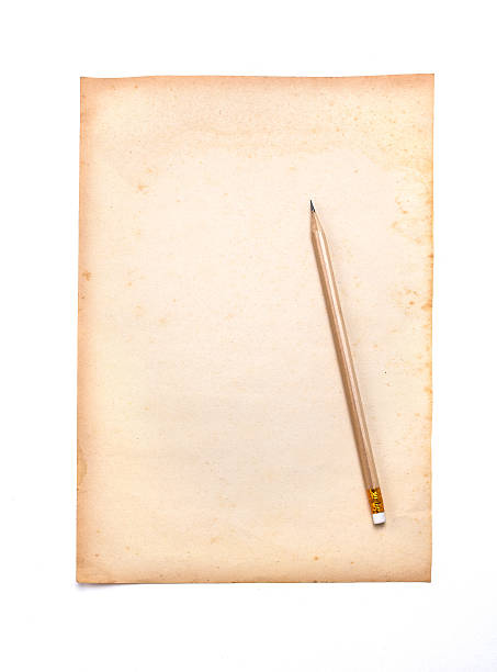 istock wooden pencil on old paper 531138599