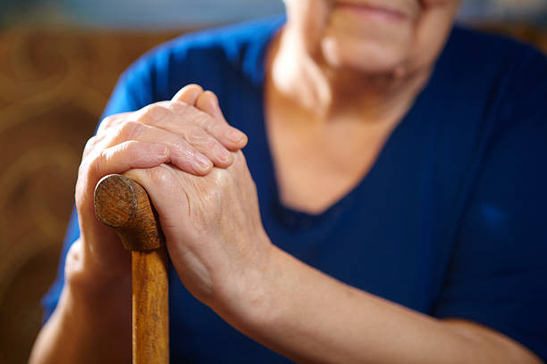 istock Old woman hands with cane 531138865