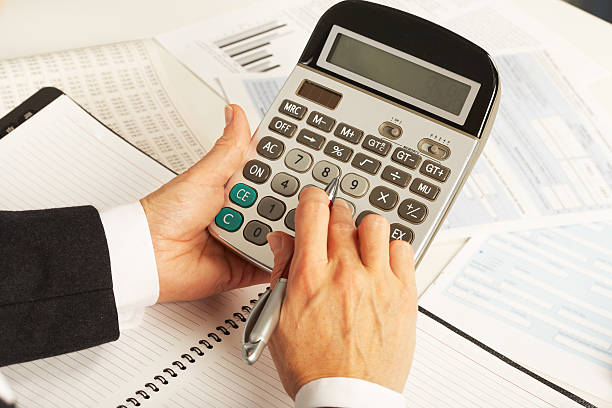 istock Businesswoman working with calculator 531139225