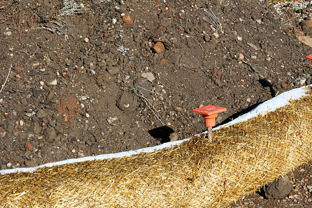 istock Black dirt with an erosion control fiber roll 531140039