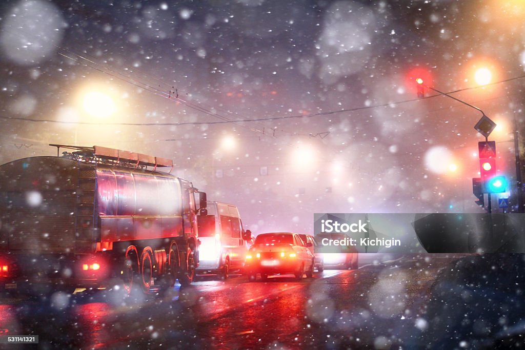 night fog city cars snowfall road at night in the city 2015 Stock Photo