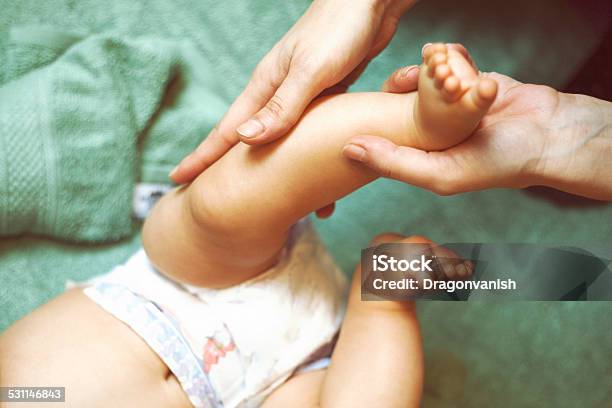Baby Massage Stock Photo - Download Image Now - 2015, 6-11 Months, Alternative Therapy