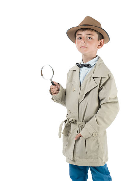 istock Little detective holding magnifying glass on white background 531147911