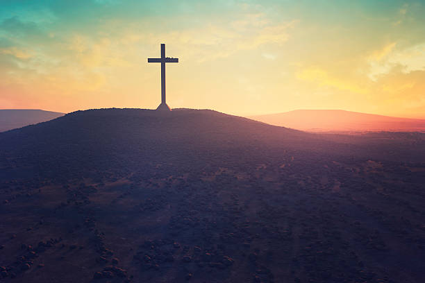 Cross in the middle of a desert.