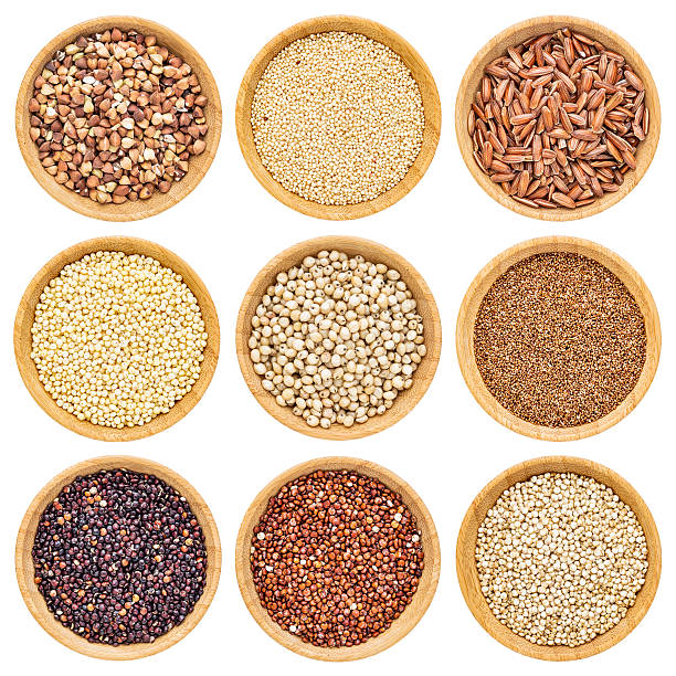 gluten free grains gluten free grains  - buckwheat, amaranth, brown rice, millet, sorghum, teff, black, red and white quinoa - isolated wooden bowls quinoa photos stock pictures, royalty-free photos & images