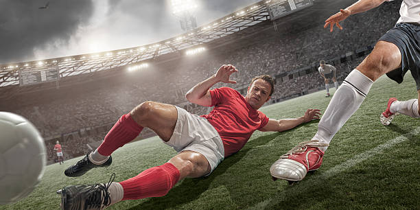 istock Soccer Action Sliding Tackle 531159351