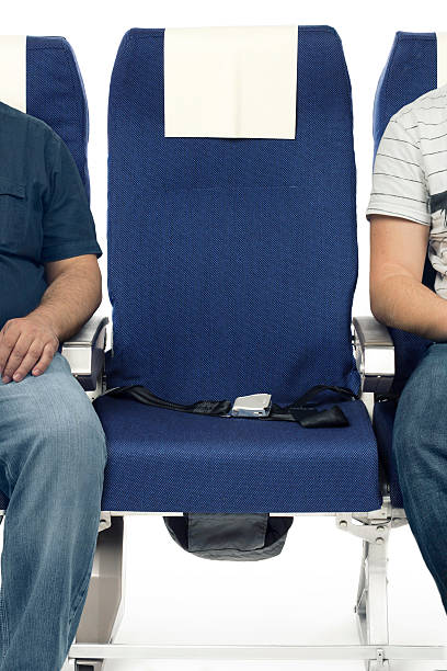 Airplane seats Real airplane seats shot in studio mid section stock pictures, royalty-free photos & images