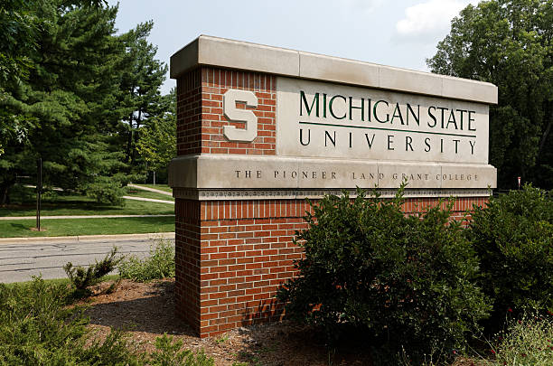 Michigan State University East Lansing, MI, USA - August 1, 2014: An entrance to Michigan State University. MSU is a public research university located in East Lansing, Michigan. entrance sign photos stock pictures, royalty-free photos & images