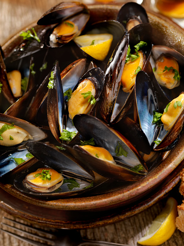 Bucket of Steamed Mussels with Fresh Parsley, Lemon and Bread -Photographed on Hasselblad H3D2-39mb Camera