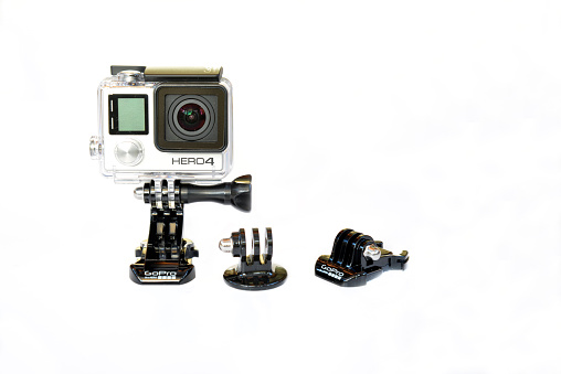 Northampton, England- January 6, 2015: A gopro hero 4 black edition. Photographed against a white background. This is the latest Gopro model to be released and first apeared in November 2014.