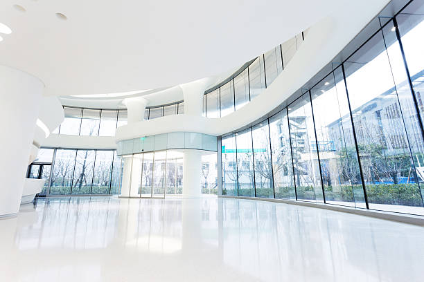 istock futuristic modern office building interior in urban city 531164647