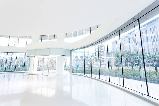 istock futuristic modern office building interior in urban city 531164649