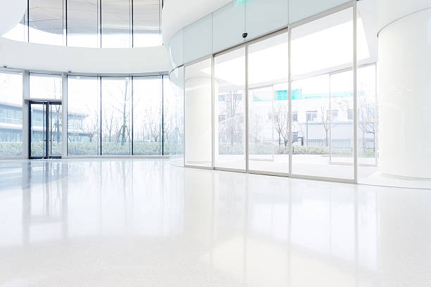 istock futuristic modern office building interior in urban city 531164795