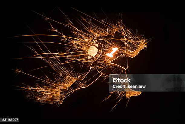 Football Player Running With Ball On Black Background Stock Photo - Download Image Now