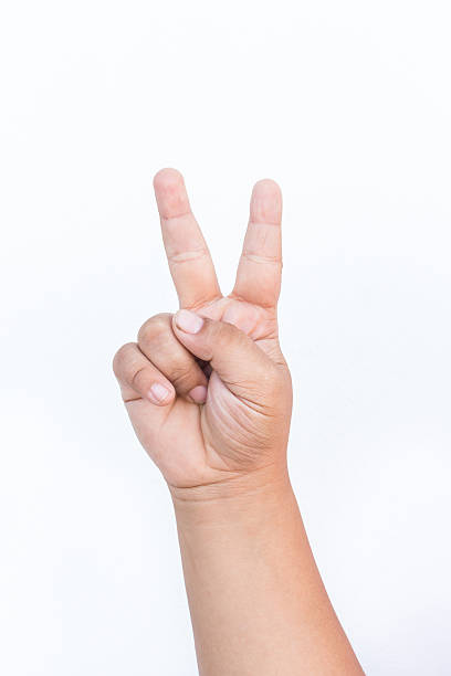 istock isolated child hand shows the number two 531165811