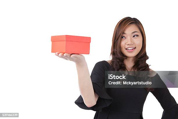 Christmas Happy Woman Playful Receiving Holiday Valentines Da Stock Photo - Download Image Now