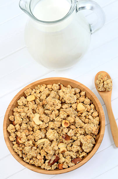 istock Pitcher with milk and muesli in a bamboo bowl 531167390
