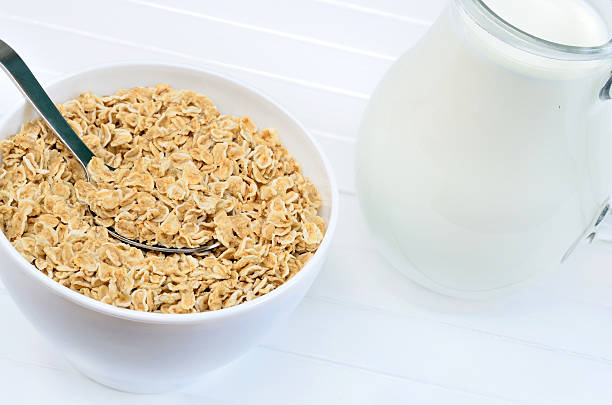 istock Oat flakes in a white bowl with milk 531168580