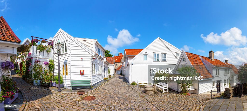 Traditional Norwegian architecture Street with white houses in the old part of Stavanger, Norway. Stavanger Stock Photo