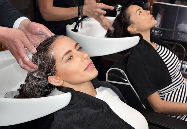 istock Girls wash head 531169364