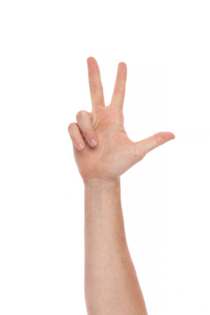istock Male hand making the number three on white background 531171096